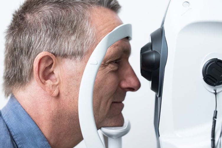 Pic of man having eye test on Specsavers equipment