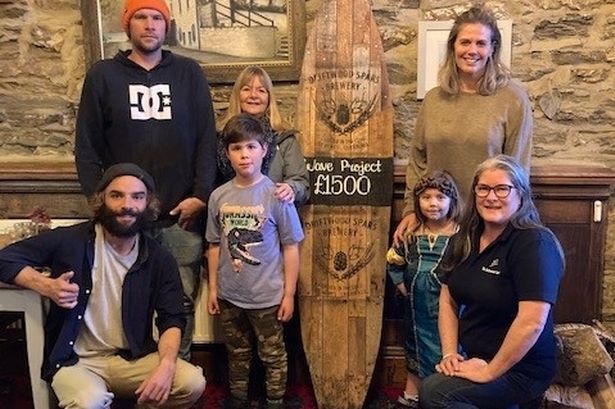 Marking the Wave Project donation (Louise Treseder of the Driftwood Spars is bottom right, and Fred Andrews of the Wave Project is bottom left)