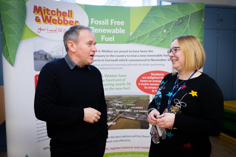 Kehelland Primary School headteacher Ellie Watkins talks to George Eustice MP about how the school is decarbonising its heating