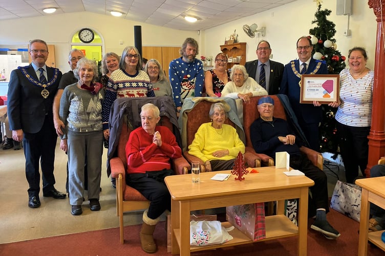 Masonic Charitable Foundation’s Mike Pritchard, Alan Powell and David Maskell with Pengarth Day Centre manager Sharon Mitchell and visitors of the centre