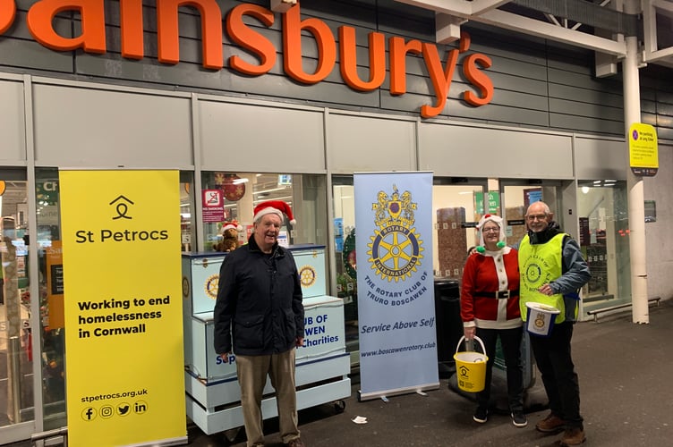 Members of the Rotary Club of Truro Boscawen taking part in their Christmas fund-raising event outside Sainsbury’s