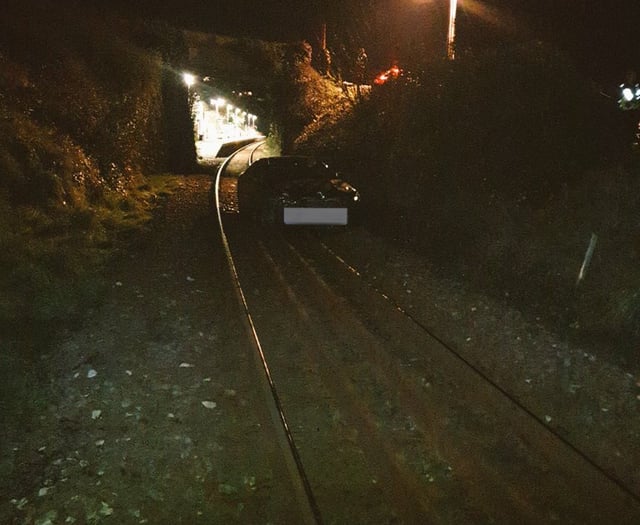Car abandoned on railway track