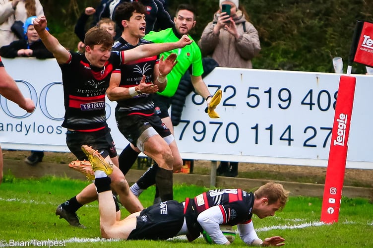 Arthur Relton and Robin Wedlake celebrate as replacement Carwyn Penny scores