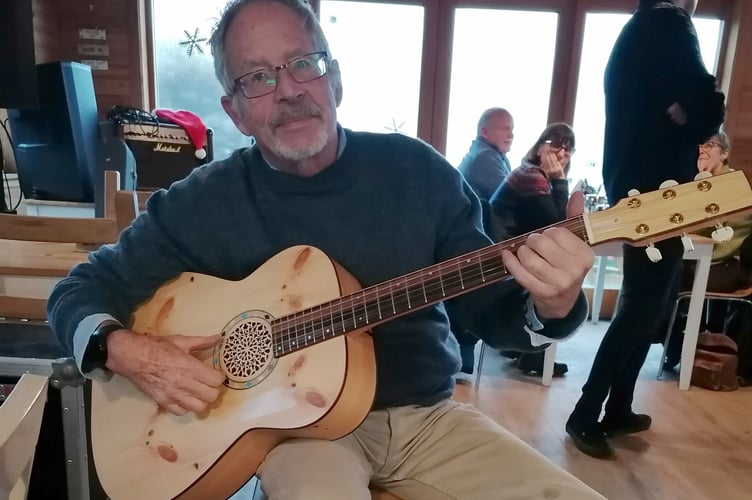 Kif Wood's handmade guitar made from scrap wood
