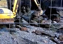 Eco warriors halt work to concrete cliff