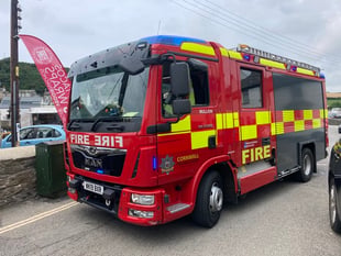 Car destroyed in blaze which spread to shop