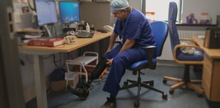 Surgeon charged with fraud after his legs were amputated