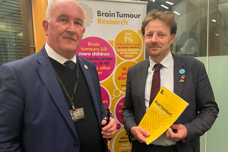 Derek Thomas with Hugh Adams from Brain Tumour Research