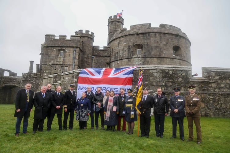 PIctured: Group photo in front of Pendennis Castle in Falmouth for the Armed Forces Day Launch.

Members of the Armed Forces joined local communities across Cornwall today to mark 100 days to go until the Armed Forces Day national event, taking place in Falmouth on 24 June.
Amid the backdrop of Pendennis Castle, service personnel from across the Royal Navy, British Army and Royal Air Force raised the official Armed Forces Day flag, declaring the countdown as having officially started.
Adding to the celebrat