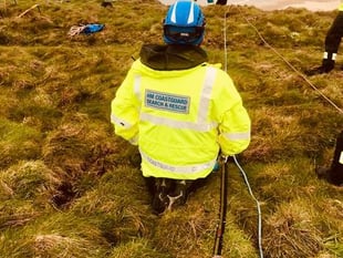 Missing woman saved after being located at the bottom of a cliff