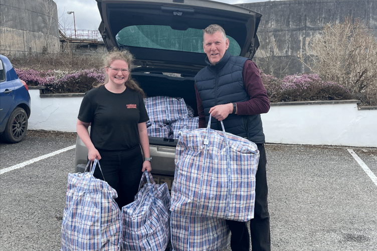 Bill and Bekah delivering warm packs to people on behalf of Harbour Housing