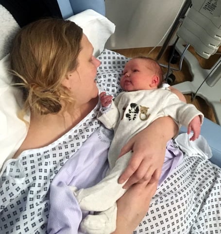 Kat Burton in hospital with her baby