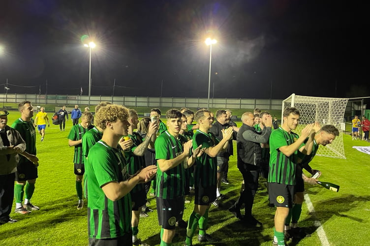 St Blazey players salute their fans.