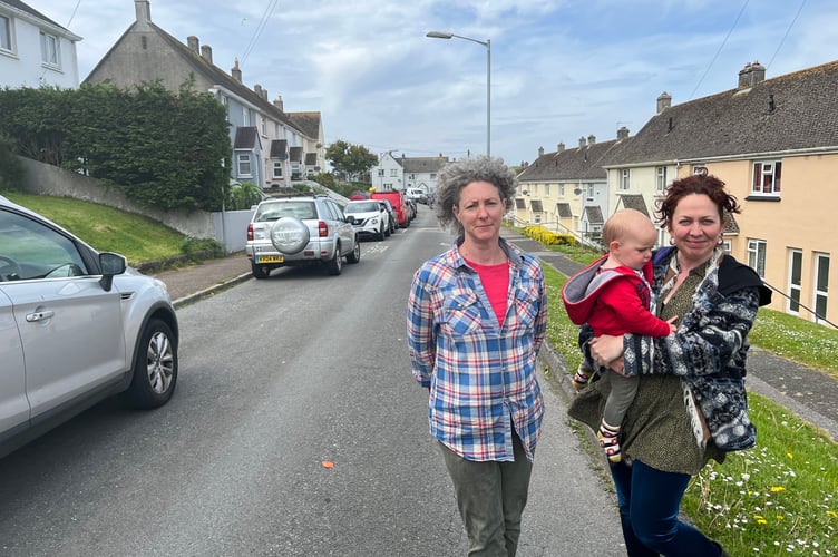 Amber Bazzoni and Laura Palmer are just two of the residents of Acacia Road unhappy with the actions of an 'over-zealous' traffic warden