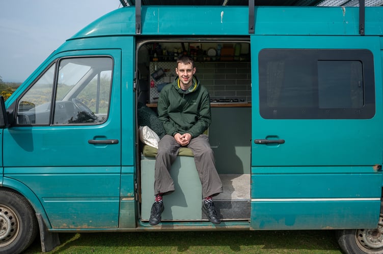 **Sent under embargo - no use before 20.00 BST May 16 2023**
Van dweller Kieran Lewis in Liskeard, Cornwall. He moved into his self converted van almost 2 years ago. See SWNS story SWNJvan. A man "priced out" of buying a property in his Cornish hometown by second home owners has resorted to living in - a van. Kieran Lewis, 23, says picturesque Looe - the setting for a hit BBC drama - has become unaffordable for locals. So he decided to spend £6,000 renovating a Volkswagen van - which he now lives in full-time. Delivery driver Kieran has no regrets and is hoping to set up a van conversion business with his savings.