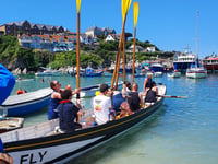 People being invited to take part in charity gig race