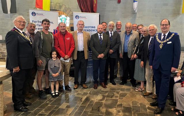 David Pasoce (far left), Tim Bunting (fourth from left), David Maskell (far right) and the other donors to the Cornwall Air Ambulance.