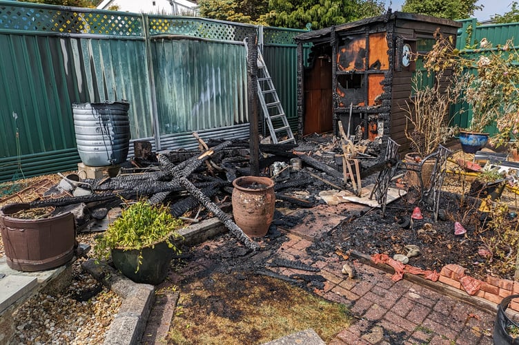 The wreckage left behind in the garden after the blaze, started by a blow torch