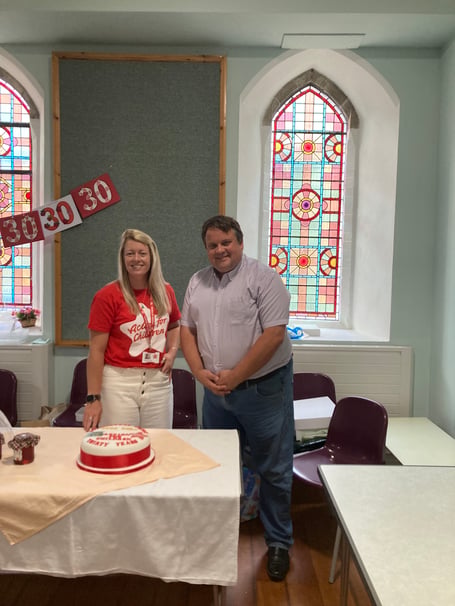 Strawberry fair James and Kayleigh with cake