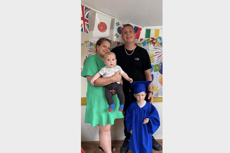 Ryan Robert Heaver, pictured with family