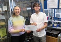 Young photographer snaps up grant