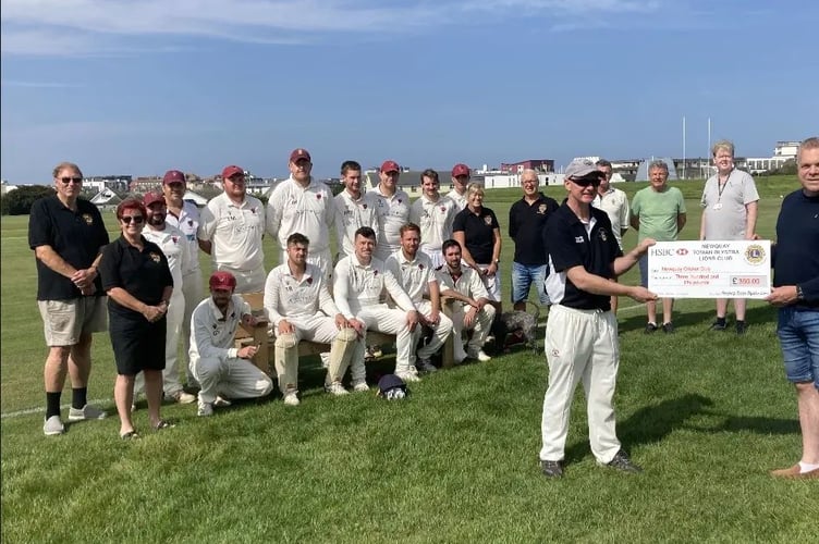 Newquay Cricket Club are presented with their cheque