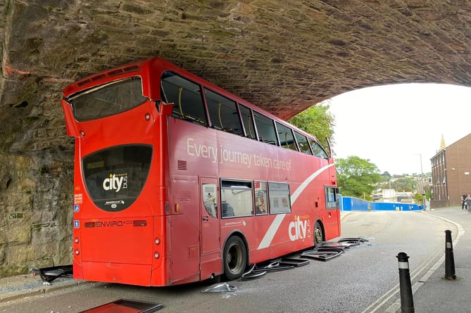 The Go Cornwall bus got stuck under the bridge in Truro's Kenwyn Road