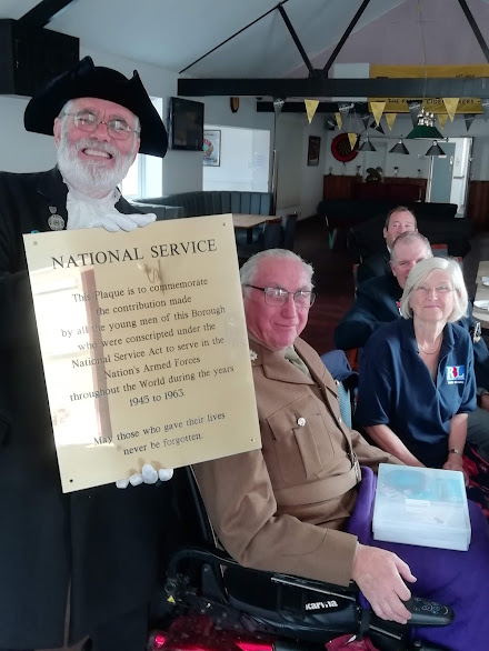 Town Crier Lionel Knight, veteran Mike Homer and Royal British Legion members in Truro