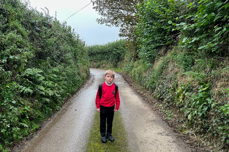 Barkley Sharp, 8, on a section of his proposed walk to school