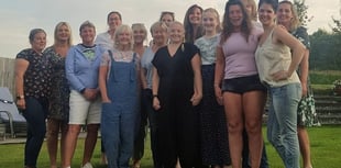 Women brave shower to stage charity event