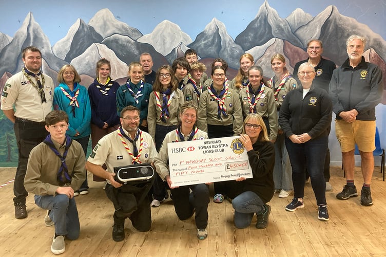 a £450 cheque and a video projector were presented by Towan Blystra Lions to the 1st Newquay Scouts