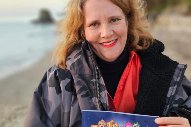 Victoria Anstey with her book