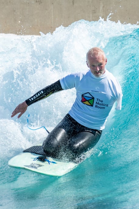 Stephen Downes in surfing action 