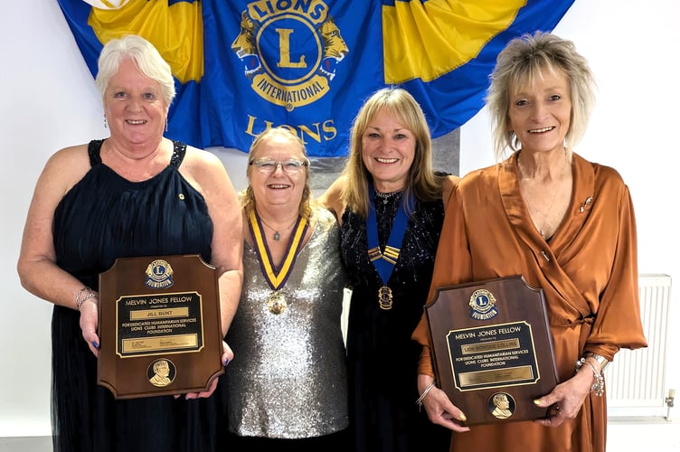 Jill Bunt and Monique Collins receiving their Melvin Jones Fellowship