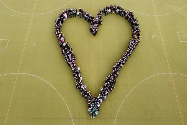 Truro High School for Girls make a heart shape