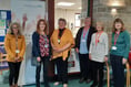 Volunteers help hospital coffee shop re-open