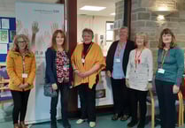 Volunteers help hospital coffee shop re-open