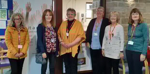 Volunteers help hospital coffee shop re-open