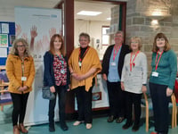 Volunteers help hospital coffee shop re-open