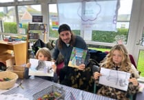Surfer writes children’s book after seal encounter