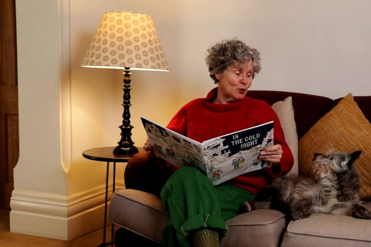 Imelda Staunton with the book In the Cold Night that is raising money for ShelterBox