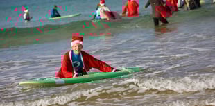 Santas hit the surf in Newquay for good cause