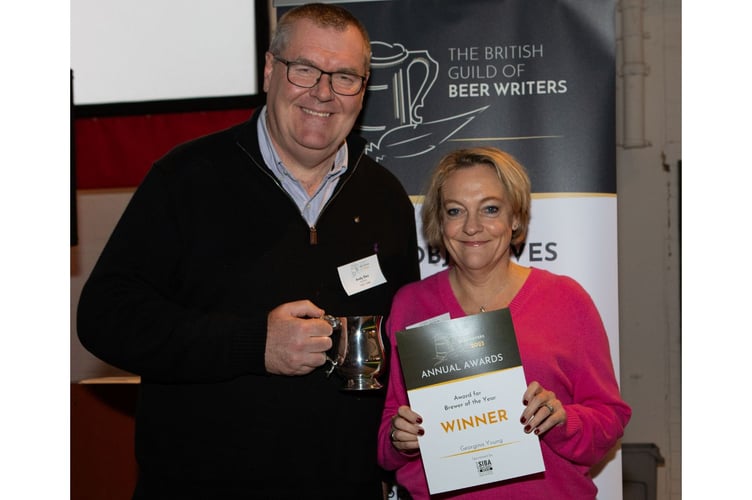 Georgina Young receiving her brewer of the year award