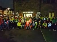 Festive runners put their best foot forward for good cause