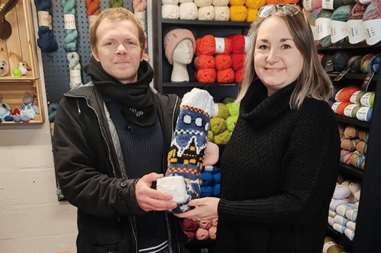 Vee Ellacott of Knit Happens with a happy Dan