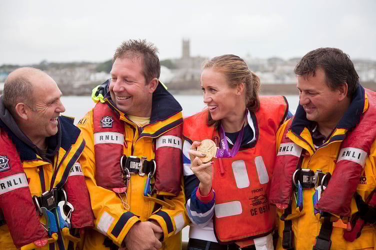 Helen Glover joking with the crew of the Penlee Lifeboat. David Osborne, Patch Harvey and Dave Pascoe.