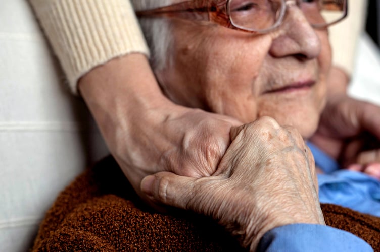 Old senior woman with her granddaughter.