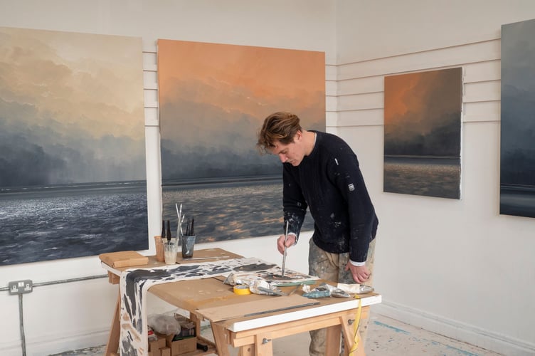 Artist Jack Davis at work in his studio