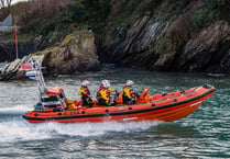 Two people cut off by tide rescued by Looe RNLI 