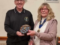 Royal Naval Association member presented with prestigious trophy 